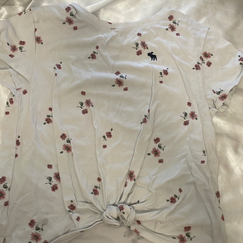 Flower design on white shirt